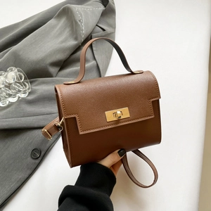 Brown mini Kelly style handbag with lychee leather texture and gold metal buckle