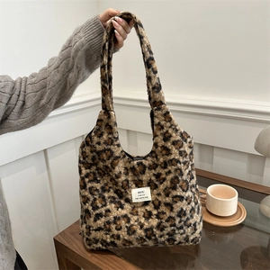 Leopard print plush tote bag with thick faux fur texture for winter fashion