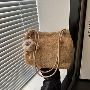 Brown fuzzy faux fur tote bag with leather straps and cute lamb charm for winter
