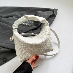 White woven leather crossbody shoulder bag with ruched cloud handle and adjustable strap