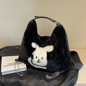 Faux fur black tote bag featuring white cartoon rabbit patch and silver chain strap