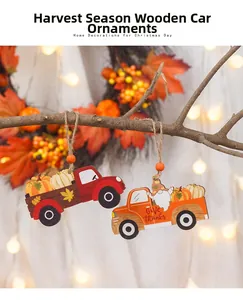 Wooden harvest truck pendants with Give Thanks text hanging on branches for fall decor