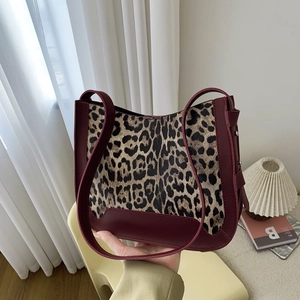 Leopard print tote bag with burgundy leather trim and studs for women's daily commute