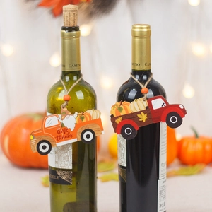 Harvest wooden truck ornaments with pumpkins and Give Thanks text for bottle decor