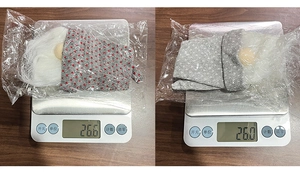 Weight measurement of Nordic knitted gnome wine bottle covers with grey plush beards
