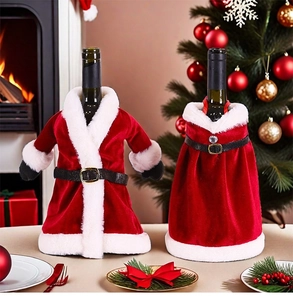 Close-up of velvet Santa suit and red dress wine bottle covers on festive table