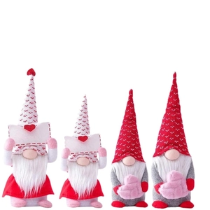 Set of four Valentine's Day gnomes with hearts and envelopes for festive home decoration