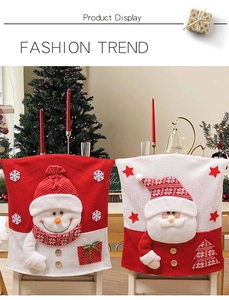 Detailed view of knitted Christmas chair covers with 3D Santa and Snowman figures