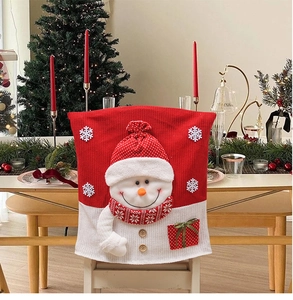 Close-up of Christmas chair cover with 3D snowman and festive knit texture details