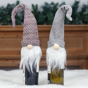 Christmas gnome wine bottle covers with gray knitted hats and white faux fur beards