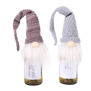 Pair of festive Christmas gnome wine bottle covers with grey knitted hats and white beards