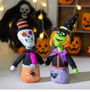 Detailed view of Halloween plush witch and skeleton dolls for tabletop decoration