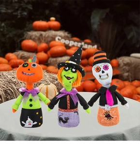 Detailed trio of Halloween figurines featuring pumpkin, witch, and skull fabric designs