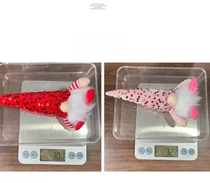 Macro view of light-up sequin Christmas gnomes showing weight measurement and festive details