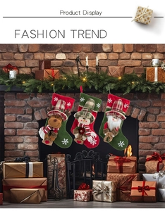 Three Christmas stockings with 3D reindeer snowman and Santa on a brick fireplace