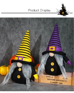 Detail of Halloween faceless gnomes with striped hats and plush beards for home decor
