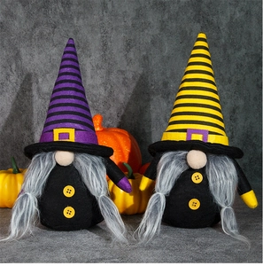 Detail of Halloween gnome plush dolls with striped hats and pumpkin decor in background