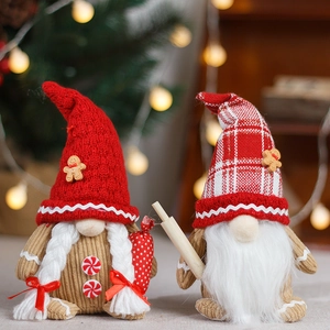 Christmas gnome doll set featuring gingerbread patterns and cozy knitted hats for decor