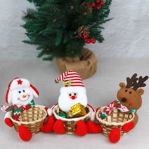 Tres cestas de regalo de Navidad con motivos de Papá Noel, muñeco de nieve y reno