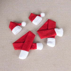 Christmas mini wine bottle covers set with red and white scarves and pom-pom hats