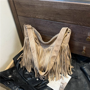 Bohemian khaki fringe hobo bag in faux suede with adjustable shoulder strap