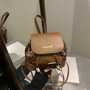 Retro leopard print mini backpack with brown PU leather and drawstring closure