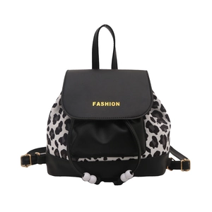 Chic leopard print bucket backpack with black leather flap and drawstring closure