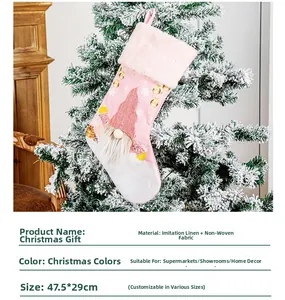 Pink Christmas gnome stocking detail made of faux linen with 47.5x29cm dimensions
