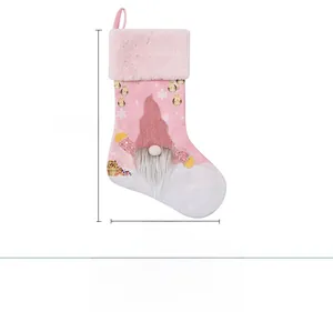 Pink Christmas gnome stocking showing height of 47.5cm and width of 29cm on white background