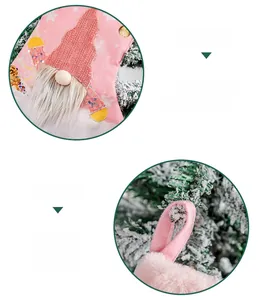 Detailed view of pink Christmas gnome stocking featuring soft plush cuff and hanging loop