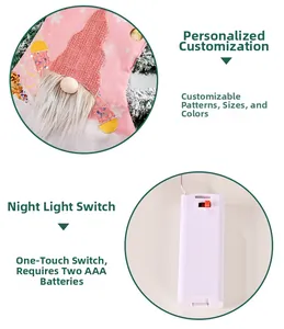 Pink LED Christmas stocking detail showing battery pack switch and light-up gnome feature
