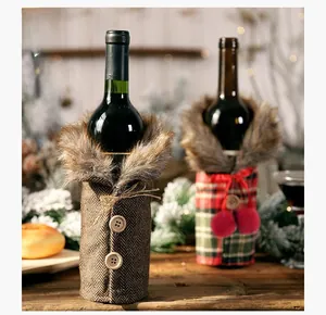 Close-up of Christmas wine bottle covers with plaid patterns and faux fur collar details