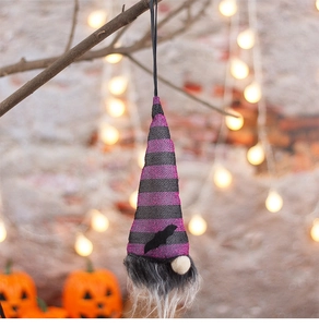 Close-up of Halloween gnome hanging decoration with purple sequin hat and black bat icon