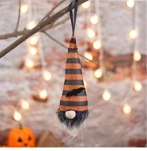 Hanging Halloween gnome with orange stripes and bat detail on a festive lit background