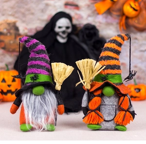 Detail of Halloween gnome plush set with striped hats, spider accents, and straw brooms