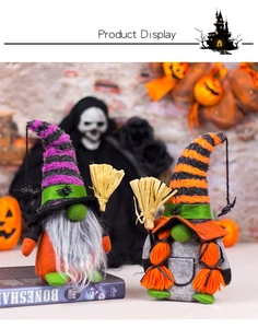 Macro shot of Halloween gnomes with stripe hats, mini brooms, and spider details