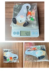 Detailed view of DIY wooden gnome ornament weighing 40.8g with various seasonal accessories