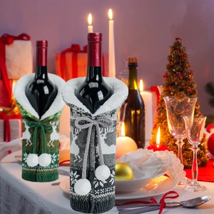 Christmas knitted wine bottle covers with reindeer patterns and faux fur collars