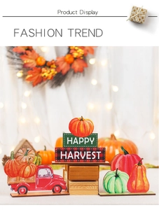 Detail of wooden Happy Harvest decor featuring a red truck and painted pumpkin set