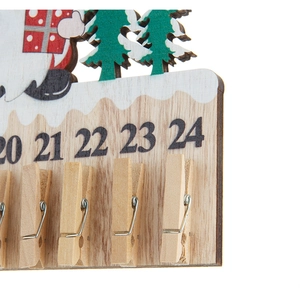 Close-up of wooden Christmas countdown plaque with gnome art and spring clips
