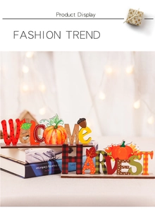 Close-up of wooden Thanksgiving pumpkin table decor with Harvest and Welcome lettering