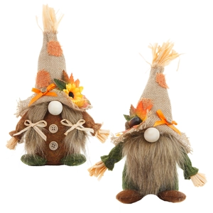 Harvest festival gnomes set with sunflowers and maple leaves for autumn table decor