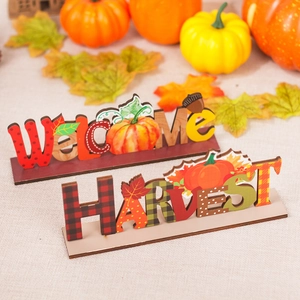 Wooden harvest welcome and harvest signs with pumpkins and maple leaves for table decor