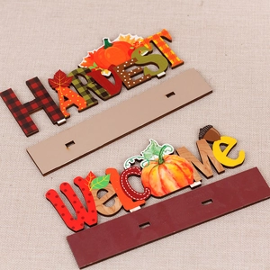 Wooden Thanksgiving table decor with Harvest pumpkins and Welcome sign on a wood base