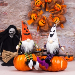 Halloween faceless gnomes with witch brooms and pumpkin bases for home festive decoration