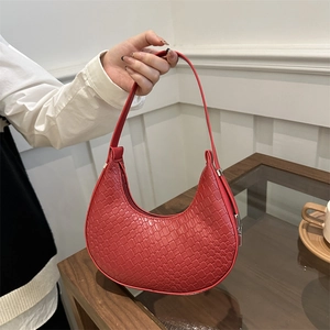 Chic red crocodile-embossed crescent underarm bag with silver zipper for women