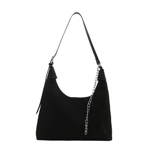 Chic black soft leather hobo bag with adjustable strap and decorative silver chain