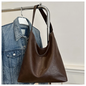 Detail of dark brown large Hobo bag in vintage PU leather with wide shoulder strap
