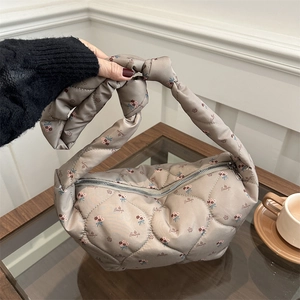 Quilted cloud bag with floral print and knot handle in taupe polyester fabric
