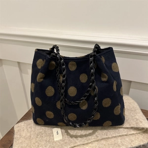 Women large capacity navy tote bag with brown polka dots and woven handles on a scarf